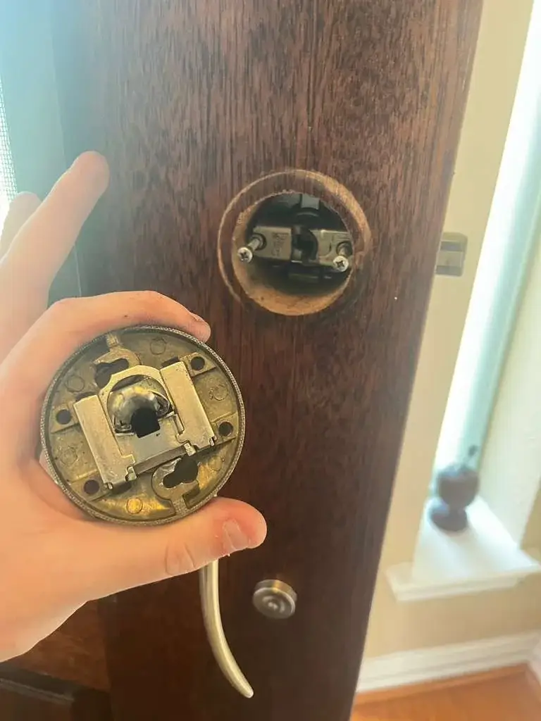 Inside components of a residential door lock during service